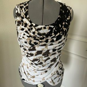 Tahari sleeveless top. Size medium. Brown, gold and cream print.